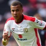 Dele Alli playing for MK Dons
