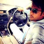 Gaurav S Bajaj poses with his Mercedes Benz car