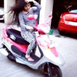 Farhina Parvez poses with her TVS Scooty Pep Plus