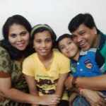 Digamber Naik with his wife and children